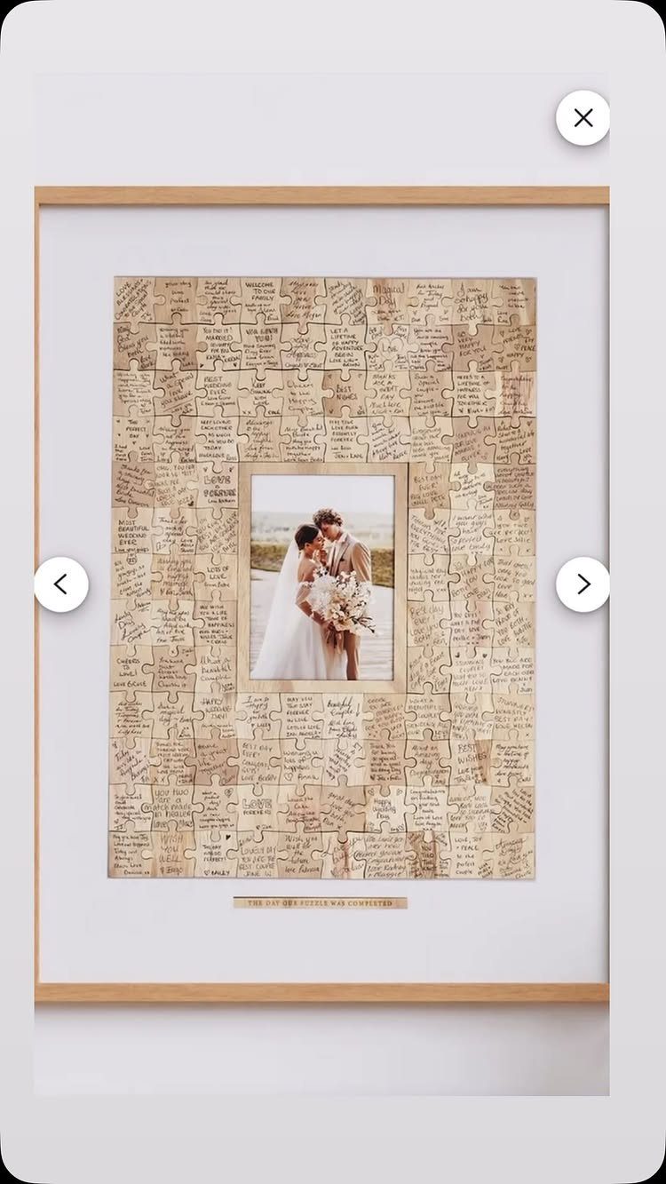 Framed wedding photo surrounded by puzzle pieces with handwritten guest messages.